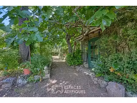 appartement d'exception avec jardin secret aux arceaux