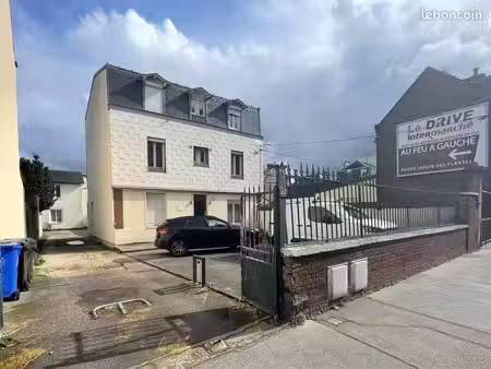 immeuble de rapport 11 logements + 4 garages