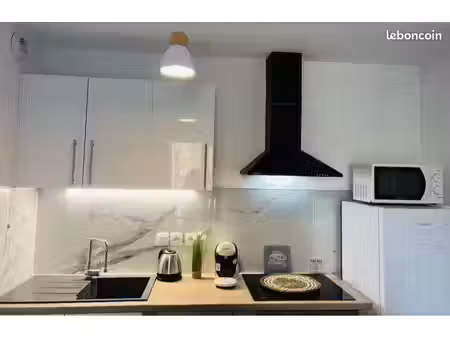 appartement avec place  parking double couverte  cave et grand balcon