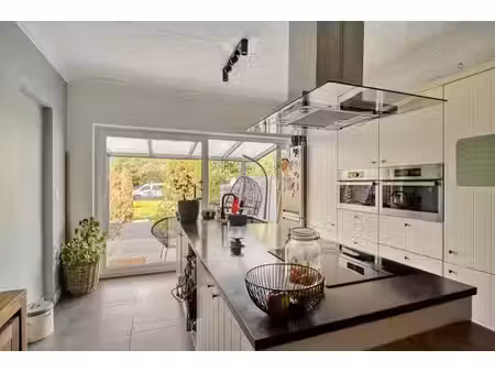 appartement avec espace commercial et grand jardin à hasselt