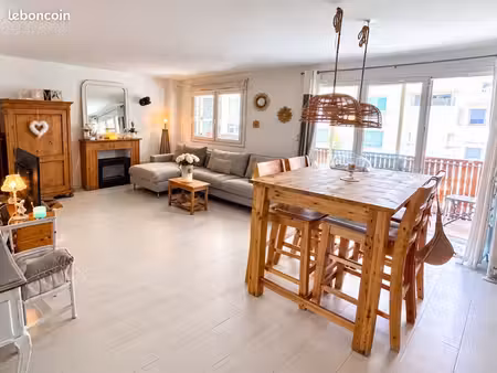 bel appartement t3 traversant 67m2 avec cave  local commercial 25m2 et parking