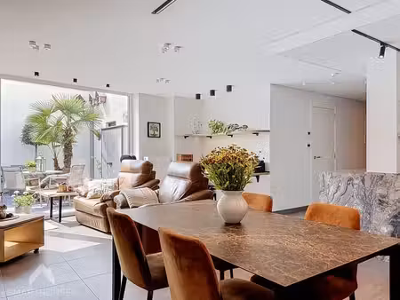 appartement au rez-de-chaussée avec 2 chambres et carport