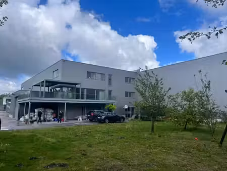 bilzen – bâtiment polyvalent à louer