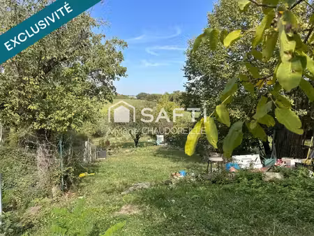 terrain de 725 m² au cœur du village de latrape (31410)