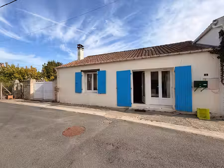 maison en pierre de charme avec charpente apparente