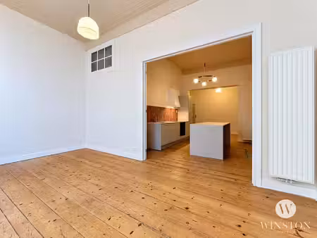 cinquantenaire | appartement 2 ch | rénové | sans charges