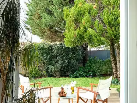 maison centre ville avec jardin   2 terrasses  et garage