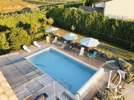 maison avec piscine et grand terrain constructible