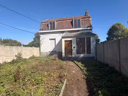 maison 4 façades avec jardin à l'avant