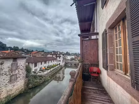 ensemble de 4 logements au centre ville de st jean pied de p