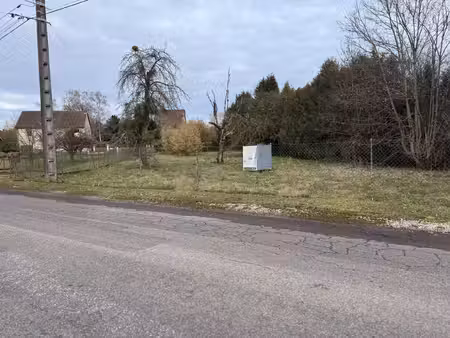terrain à bâtir situé dans un environnement calme.
