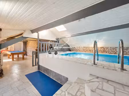 maison familiale avec piscine intérieure à 2 min de valencienn