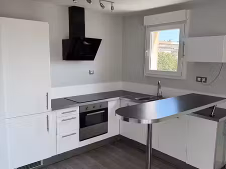 appartement 49m2 avec place de parking privative et cave
