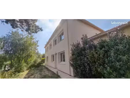 ensemble de 4 appartements + jardin privatif + parkings