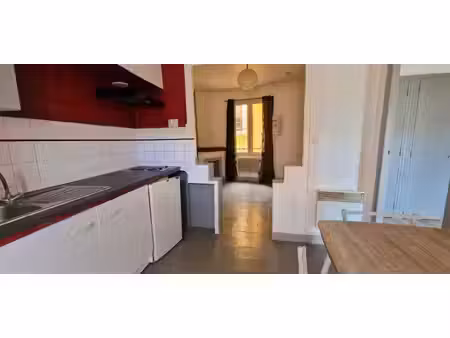 immeuble de rapport composé de 6 appartements et 2 garages