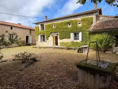 deux maisons a rénover avec leur grange et un beau terrain
