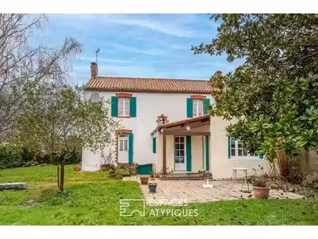 ensemble immobilier de deux maisons en plein centre bourg
