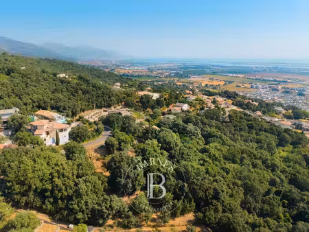 grand bastia  borgo  terrain constructible   vue mer  proche plages et commerces