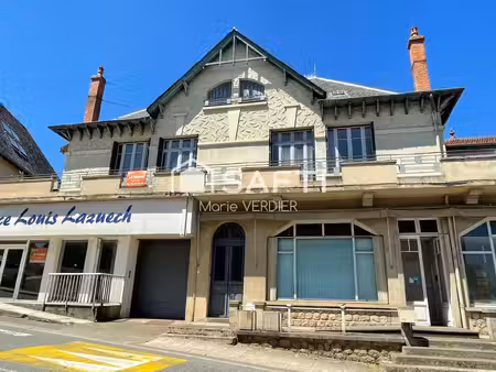 immeuble avec 1 local commercial  un t5-t6 + un studio et un beau terrain