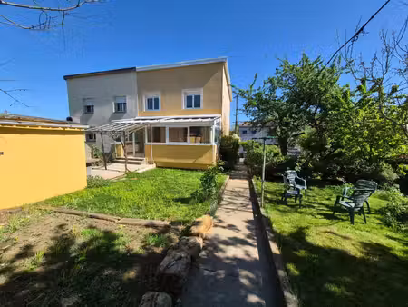 maison jumelée 5 pièces avec double garage  véranda et jardin plein sud