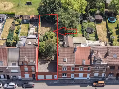 terrain à bâtir de 287m² avec garages à buizingen