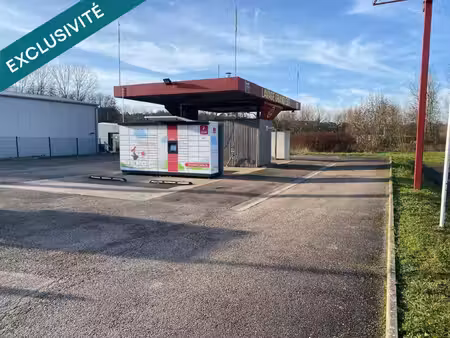 terrain industriel d'une surface de 2274 m2 sur lequel est pose une station de lavage   en