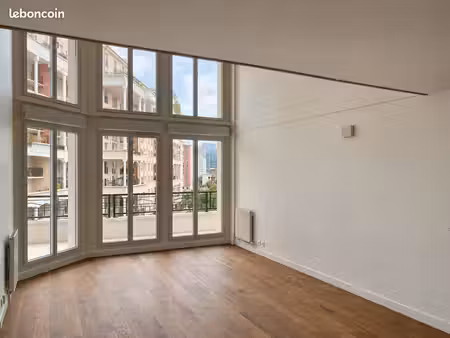 duplex 112 m²  séjour cathédrale  terrasse 21 m²  vue arche de la défense