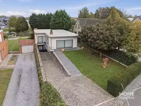 rustig gelegen bungalow met ruime tuin en veelzijdige kelderruimte