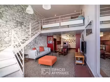 une ancienne imprimerie transformée en duplex contemporain