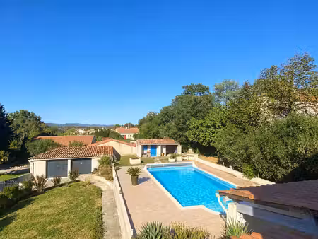 sud d'anduze  maison f7 avec double garage  piscine sur 2411 m2 de terrain clos et arboré