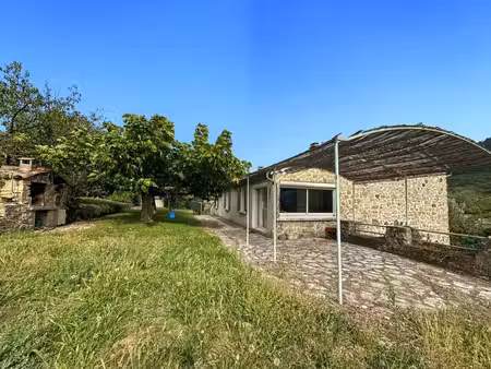[exclusivité orpi] belle maison mitoyenne en pierre rénovée avec jardin de 1 500 m² –...