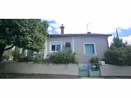 maison à rénover avec jardin et garages