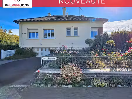 maison de 74 m² avec sous-sol et double garage posé sur un terrain de 1 200 m².