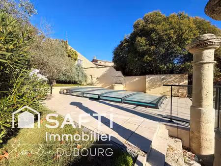 vayres - maison de caractère en pierre avec piscine chauffée et beaux volumes !