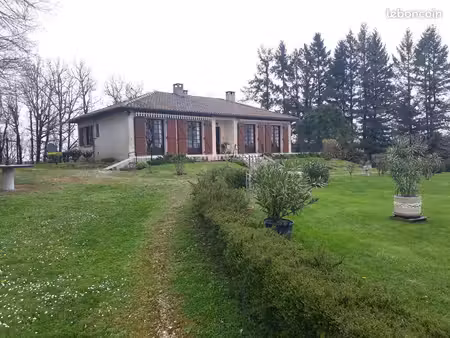 maison plein pied semi enterré