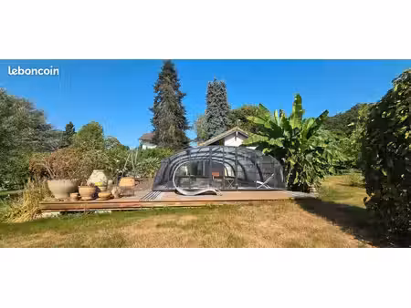 à saint paul 65 terrain 3800m2 paysagé avec piscine chauffée  dépendances . et habitation 