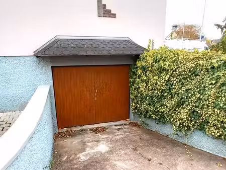 garage fermé et sécurisé au sous-sol d'une maison à illkirch