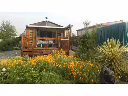mobil home avec garage sur terrain proche du lac