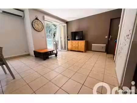 vente appartement + place de parking