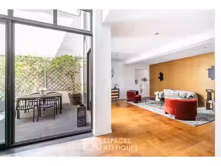 loft à la rénovation contemporaine au calme avec patio privatif