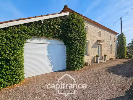 maison en pierre  4 chambres  garage  jardin piscine et puits