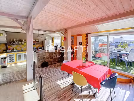 un 2 pièces atypique de 66 m²  lumineux et plein de charme !