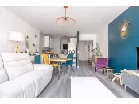 appartement 3 pièces de 61 53 m² avec cave et box – centre-ville