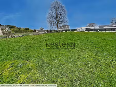 à vendre terrain constructible d'environ 690m² au coeur de marzan