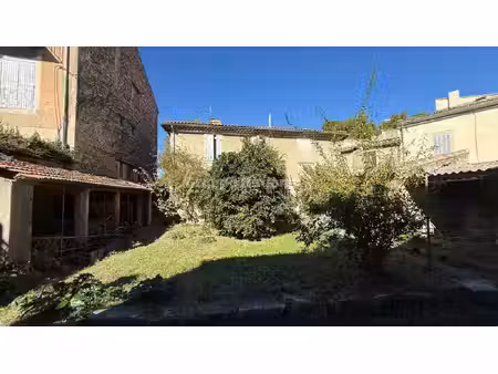 exclu maison de village avec jardin à montfrin