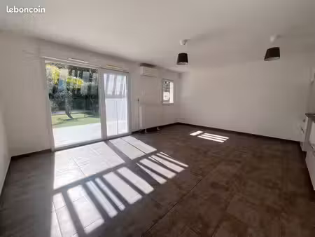 t3 rez de jardin + parking