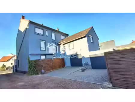 maison aux beaux volumes avec studio et local commercial loué