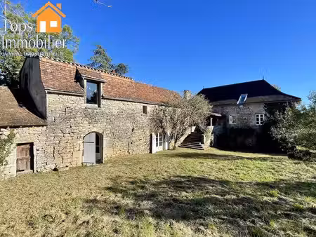 belle et grande demeure en pierre avec dépendance et 1 5 hectares de terres
