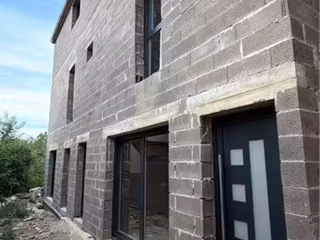immeuble de rapport avec 4 logements + terrain constructible de 650m2