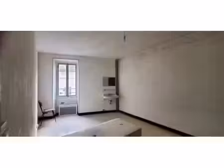 appartement de caractère immeuble 1900 en plein coeur de ville